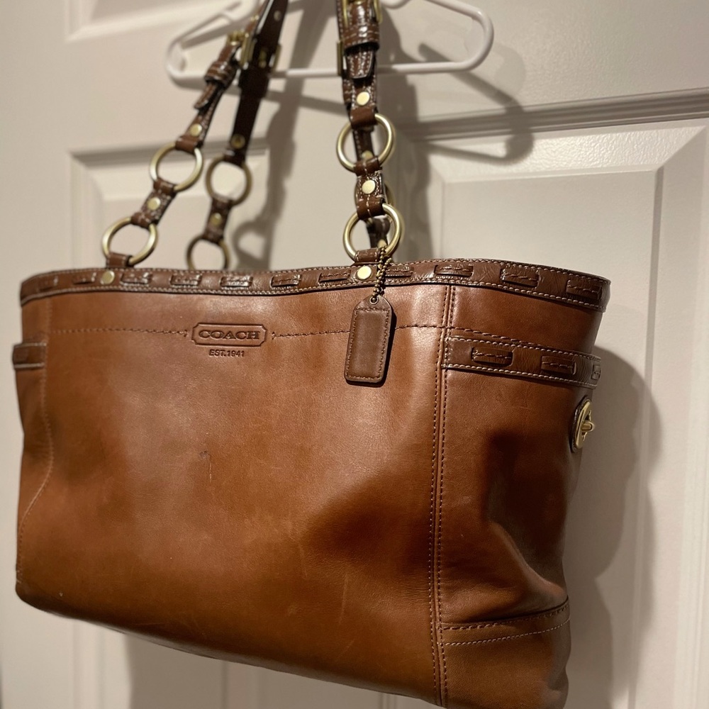 Coach brown leather tote bag with hardware detailing